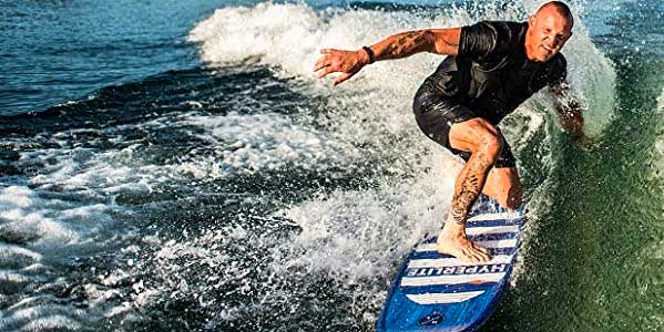 Man Riding Hyperlite Landlock Wakesurf Board on Small Wake Behind Boat