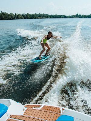 Child Wakesurfing Behind a Boat - Creating Optimal Wake Size and boat Speed for the Perfect Surfing Ride